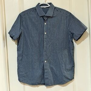 blue  shirt.Small plaid